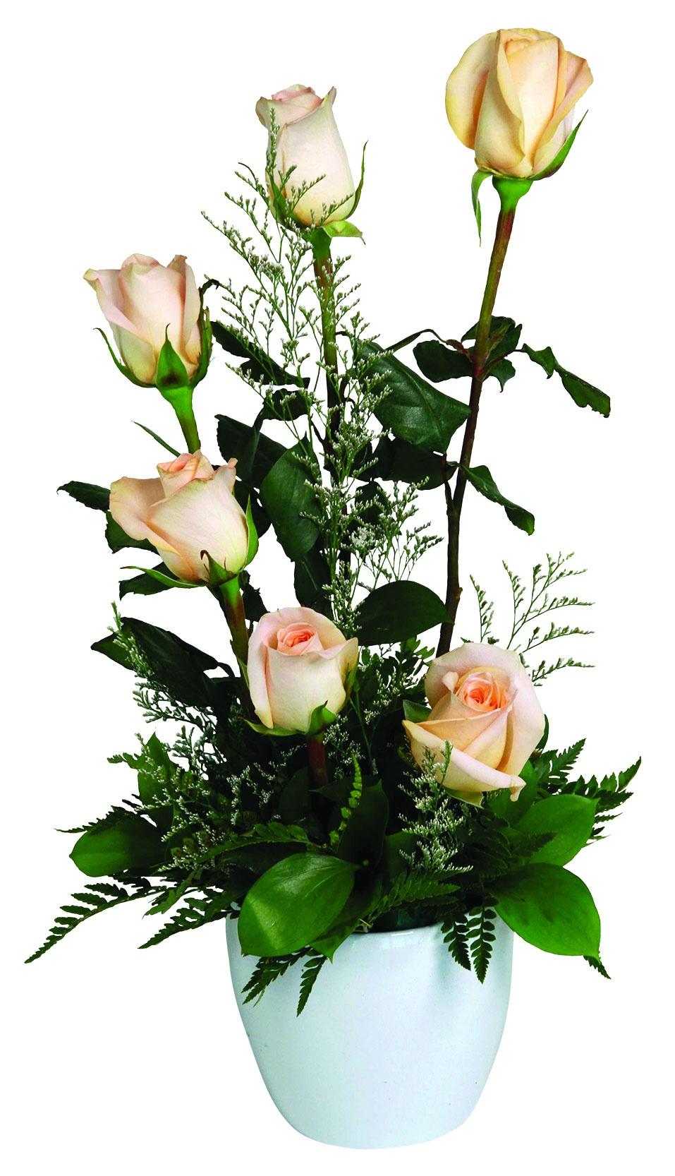 A fresh arrangement with a spiral of pink roses, greens and fillers.
