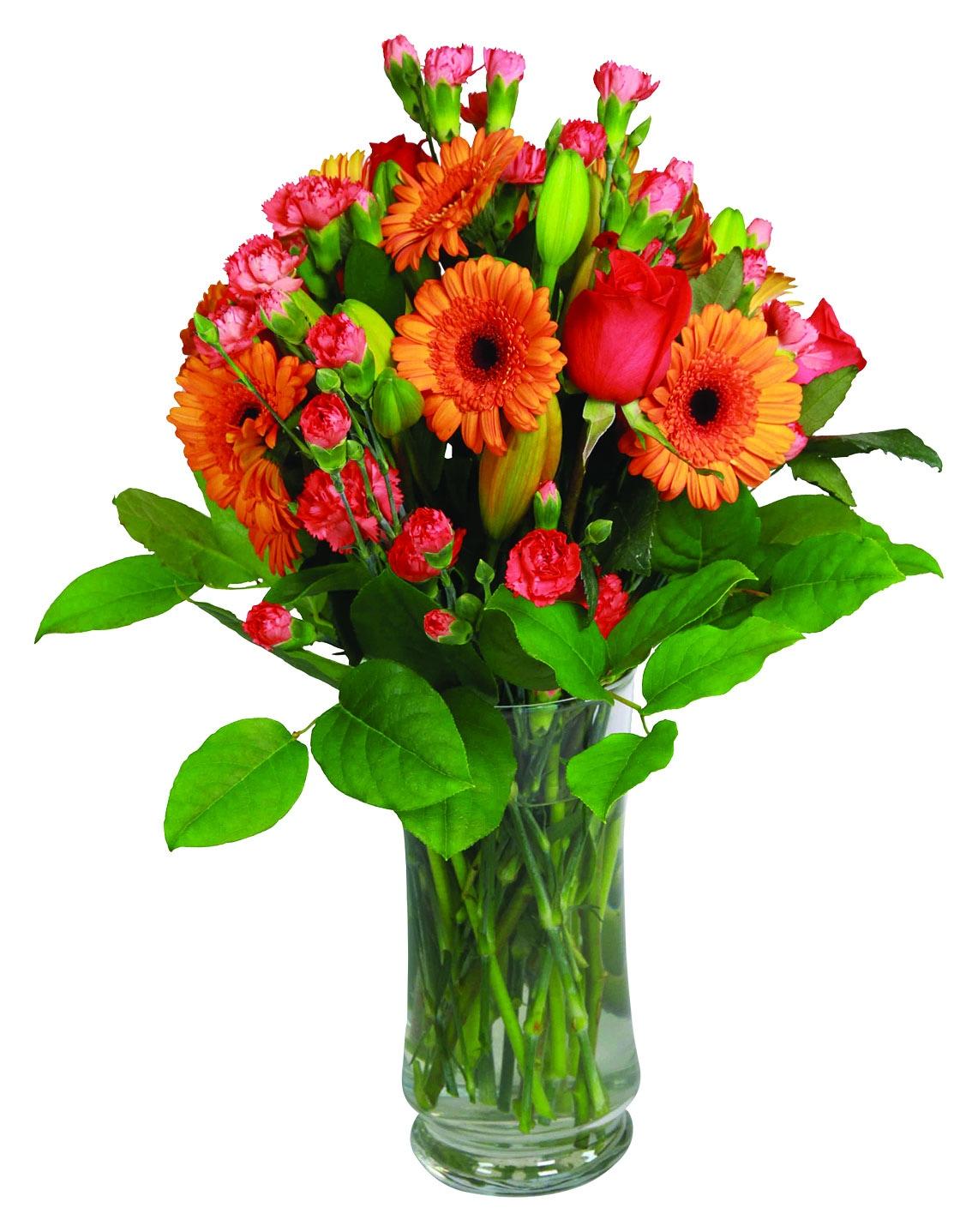 A vase arrangement with orange roses, gerberas, mini carnations, lilies, greens and fillers.
