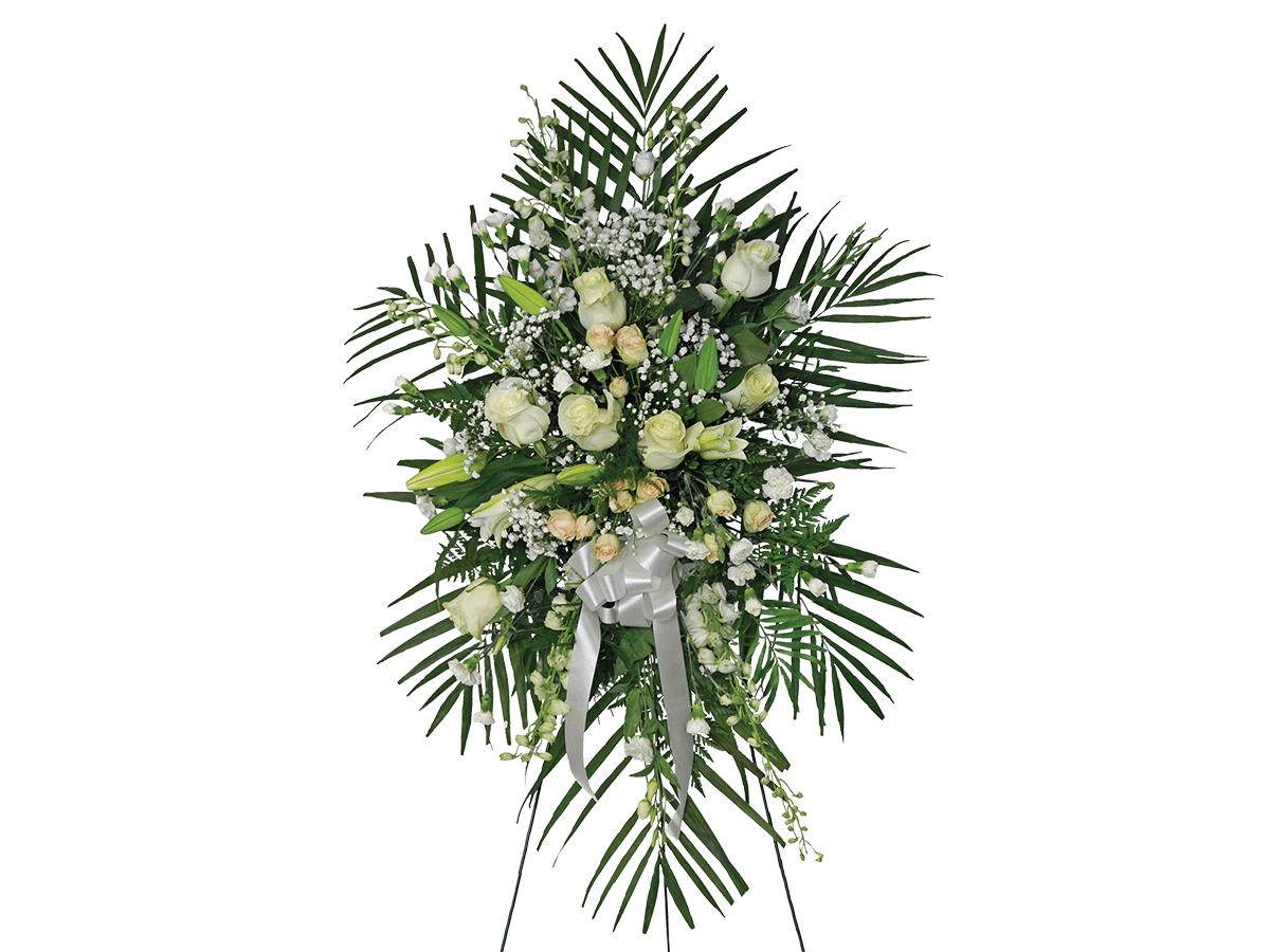 A standing spray with white roses, delphiniums, lilies, mini carnations and greens.